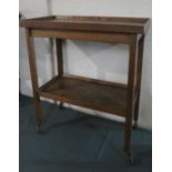 An Edwardian Oak Two Tier Trolley, 70.5cms Long