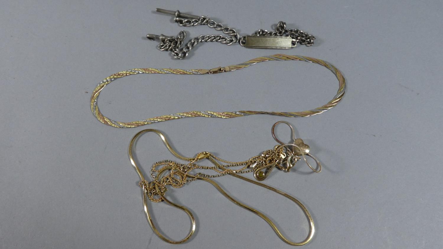 A Collection of Gold and Yellow Metal Necklaces, Silver T Bar and Watch Chain, Silver Identity