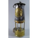 A Brass and Steel Miner's Safety Lamp by the Protector Lamp and Lighting Company Limited, Type HL