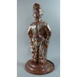 An Early 20th Century Enamelled Metal Fire Iron Holder in the Form of a Dutch Boy, 41cm High