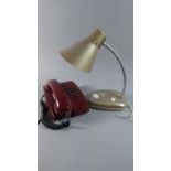A Vintage Push Button Telephone and Adjustable Reading Lamp