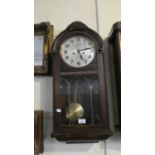 An Edwardian Mahogany Cased Wall Clock with 8 Day Movement, 31cm WIde