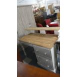 A Modern Painted Pine Writing Desk with Raised Gallery Shelf, Three Drawers and Pen Drawer Over,