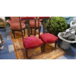 A Pair of Edwardian Inlaid Mahogany Nursing Chairs