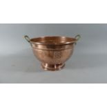 A Vintage Copper Colander with Brass Carrying Handles, 25cm Diameter