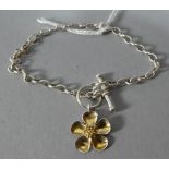 A Pretty Silver Charm Bracelet with Daisy Charm