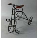 A Reproduction Iron Dolls Tricycle, 24cm High