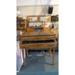 A Mid 20th Century Two Drawer Bow Fronted Canteen Table on Square Tapering Legs with Spade Feet