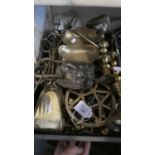 A Box Containing Brass Ornaments, Candle Sticks, Lion Mask Door Knocker, Kettle Stands, Fire Irons