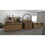 A Wicker Four Section Wine Basket, Small Picnic Basket and a Rectangular Basket