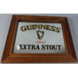 A Reproduction Pine Framed Guinness Advertising Mirror, 37.5cm Wide