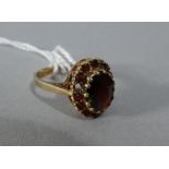 A 9ct Gold Ladies Dress Ring Mounted with Garnet, Size O, 3.6g