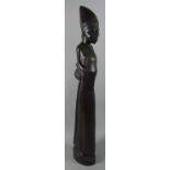 A Large Carved Wooden African Tribal Figure of a Maiden, 64cm High