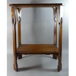An Edwardian Mahogany Two Tier Rectangular Topped Occasional Table with Pierced Supports, 61cm Wide