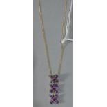A 9ct Gold Necklace with Pendant Having Tanzanite Floral Dropper, 4.8g