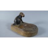 An Edwardian Carved Wooden Stand with Fox Terrier Mount and Beaten Copper Dish, 13.5cm Long