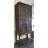 A Carved Oak Side Cabinet with Panelled Doors, Stretcher Shelf, 62cm Wide