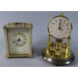 A Small Pillar Clock and an Estyma Carriage Clock with Battery Movement