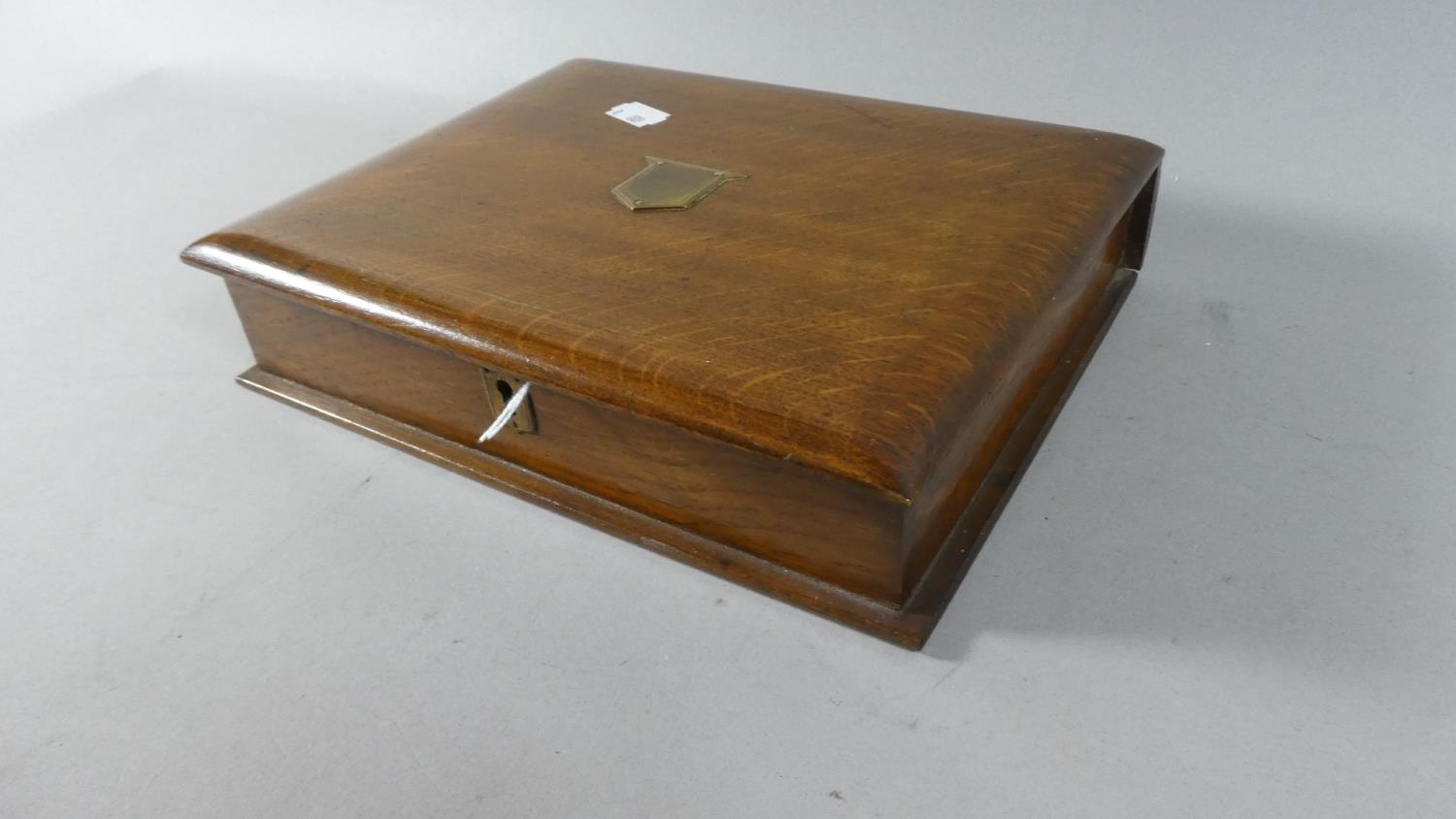 An Edwardian Oak Writing Box with Hinged Lid to Fitted Interior, Brass Escutcheon, 25cm Wide