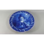 A Large Blue and White Dutch Delft Charger Decorated with Gent Smoking Pipe, 41cm Diameter