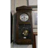 An Oak Cased Edwardian Westminster Chime Wall Clock, 30cm wide x 22cm High