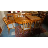 A Dining Room Suite Comprising Oval Extending Table and Six Chairs