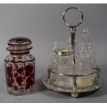 A Silver Plated Five Bottle Cruet and an Overlaid Glass Jar