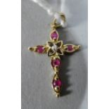 A 9ct Gold Crucifix with Rubies and Central Diamond, 1g