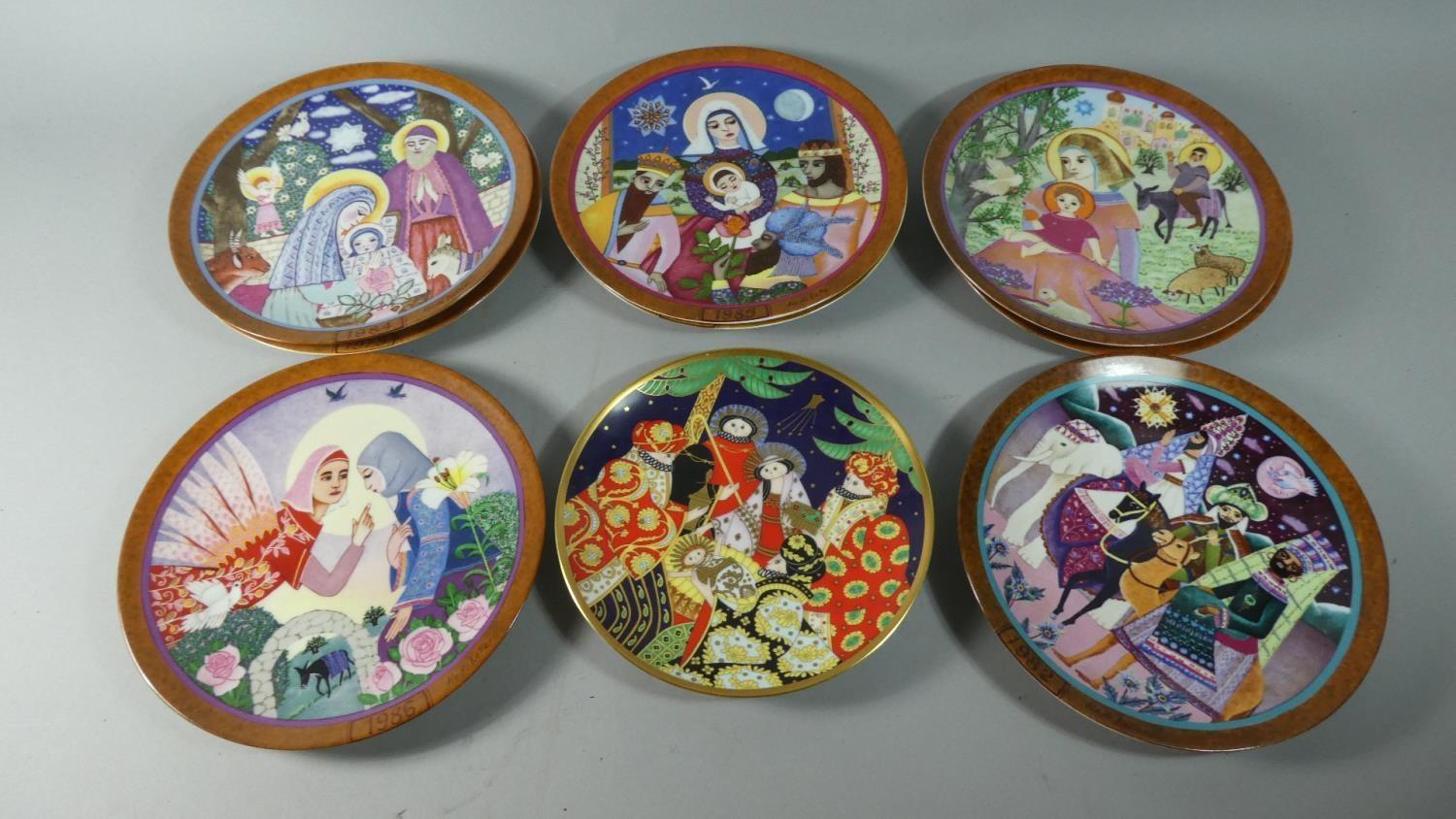 A Collection of Eight German Porcelain Christmas Plates 'The Hedi Keller Collection', with