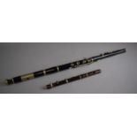 A Vintage Ebonised Irish Flute with Nickel Mounts and a Rosewood Piccolo with Nickel Mounts. Both in