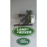 A Reproduction Cast Metal Landrover Bell and Two Wall Plaques (Plus VAT)