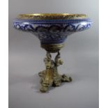 A Reproduction French Style Ormolu and Crackle Glazed Blue and White Ceramic Table Centre with