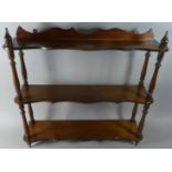 A Mahogany Three Tier Wall Shelf, 58cm Wide