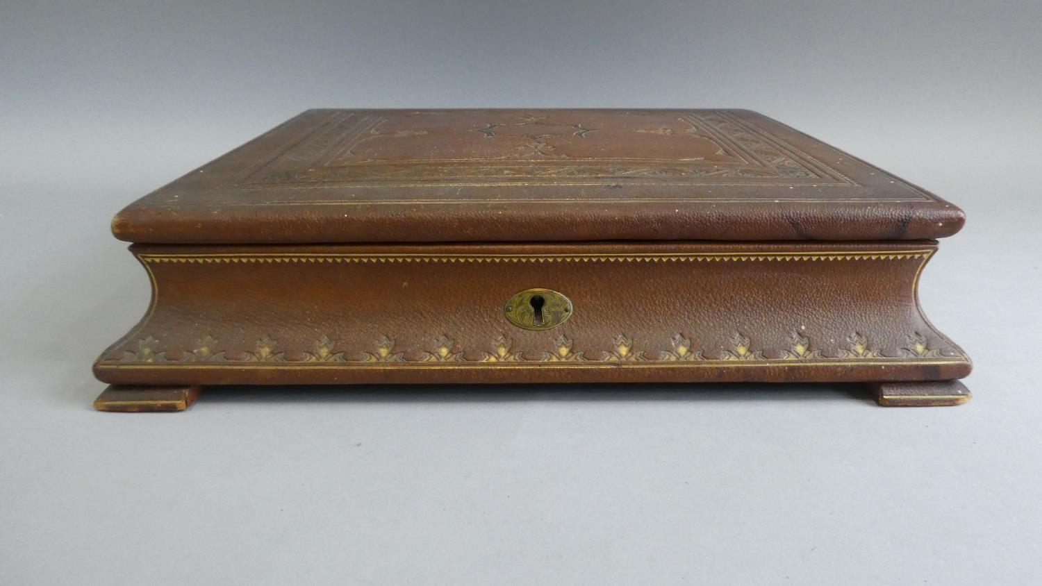 A Vintage Tooled Leather Writing Box with Hinged Lid to Fitted Interior, Removable Trays, Two