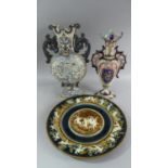 An Austrian Majolica Wall Plate Decorated with Cherubs Dancing, A Continental Two Handled Moon