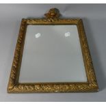 A Gilt Framed Wall Mirror with Cherub Finial, 42cm high and 31cm Wide