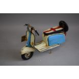 A Tin Plate Model of a Lambretta Scooter, 31cm Long (Plus VAT)