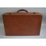 A Vintage Leather Suitcase, 56cm wide