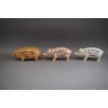 Three Reproduction American Cast Metal Money Banks in the form of Butchers Pigs, 20cm Long (Plus