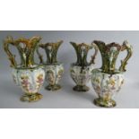 Four Italian Majolica Jugs Decorated with Flowers, 23.5cms High