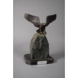 A Desk Top Ornament in the Form of Patinated Spelter Eagle on Rock, 26cm high