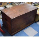 A Pine Blanket Box with Two Carrying Handles Containing Three Vintage Umbrellas, 84.5cm Wide