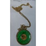 A Chinese Circular Jade Pendant Necklace with 18ct Yellow Gold Mounting and Chinese Character