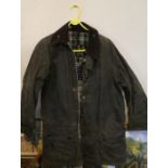 A Barbour Beaufort Wax Jacket, (Suggested Size M), Signs of wear and some damage
