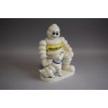 A Reproduction Cast Metal Figure, Michelin Man and Dog (Plus VAT)