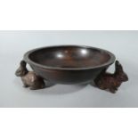 A Small Patinated Bronze Bowl the Three Supports in the Form of Young Rabbits, 12cm Diameter