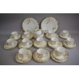 An Oriental White and Gilt Bamboo Pattern Tea Set Comprising 12 Trios, 2 Cake Plates, Sugare and
