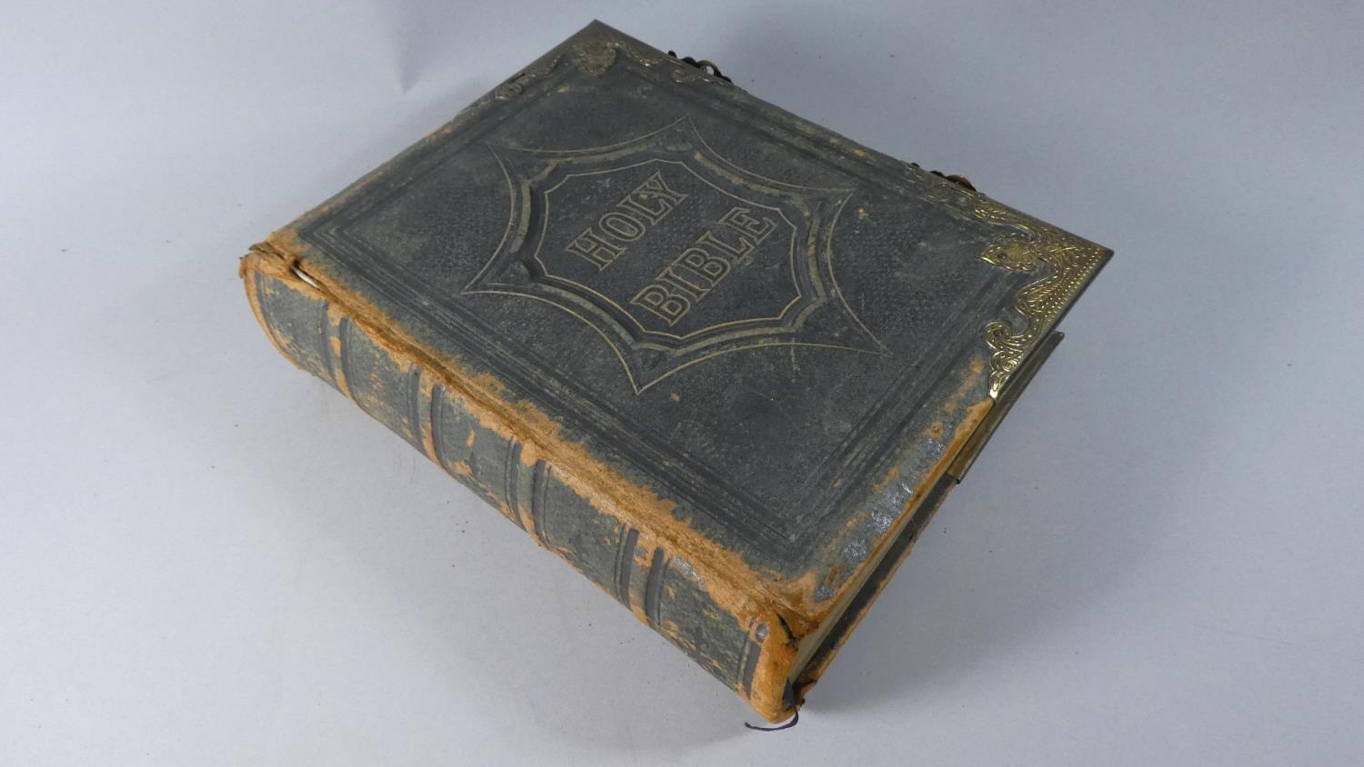 A 19th Century Tooled Leather Bound and Metal Clasped John Brown's Self Interpreting Family Bible