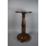 A Late 19th Century Mahogany Circular Topped Torchere Stand on Three Bun Feet, 58cm High