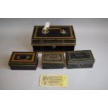 A Collection of Four Vintage Cash Tins, The Largest with Key Together with a German 1 Fine